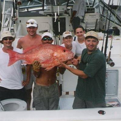 Deckhand Jessie with Red Snapper Offshore Fishing